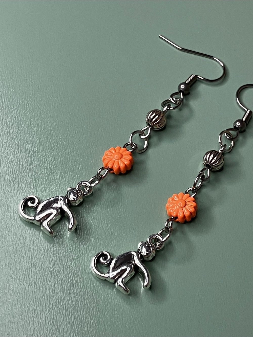 Handmade Silver Tone Monkey Dangle Earrings with Orange Flower Beads - Picture 3 of 5